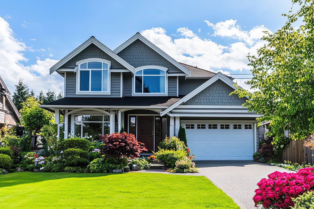 A two-story suburban home with a wide front yard.